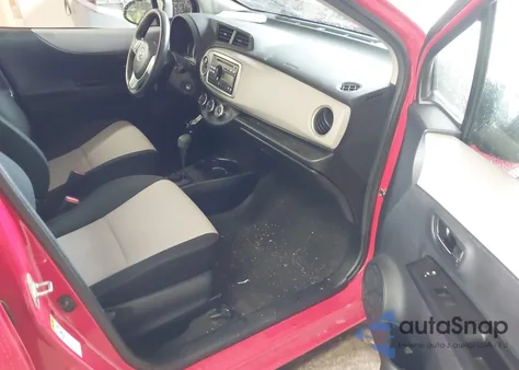 2013 Toyota Yaris Le z USA, uszkodzony, nr VIN JTDKTUD38DD561962